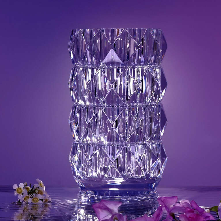 Louxor vase with flowers floating on water