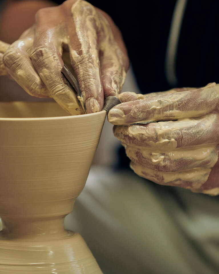 Craftsmen working with ceramics