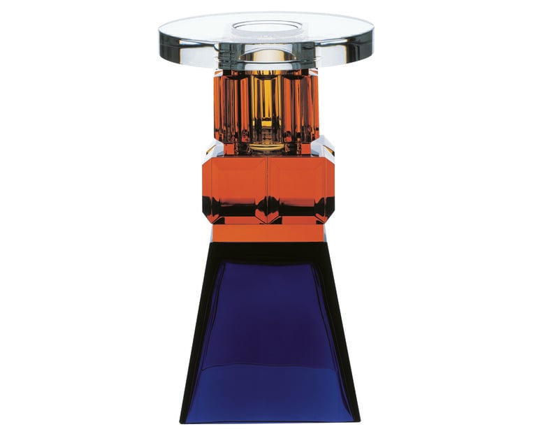 The fruit of a meeting between Ettore Sottsass and Baccarat in 2002, Ninurta is part of a collection of ten limited-edition pieces whose names evoke Mesopotamian divinities. Ettore Sottsass gives his work a divine character, bringing it to life. He breathes a certain "magic" into this transparent architecture by playing on the material effects that crystal can offer. The shapes are massive and the colors vivid, allowing light to "reflect, refract and multiply". Each of Ettore Sottsass's crystal works is an art object in its own right. By drawing inspiration from ancestral civilizations, Ettore Sottsass runs counter to the mass culture of contemporary design. In so doing, he gives the "object" a certain spiritual and cultural value.