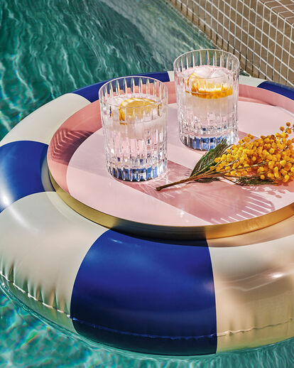 Harmonie Tumblers in a pool