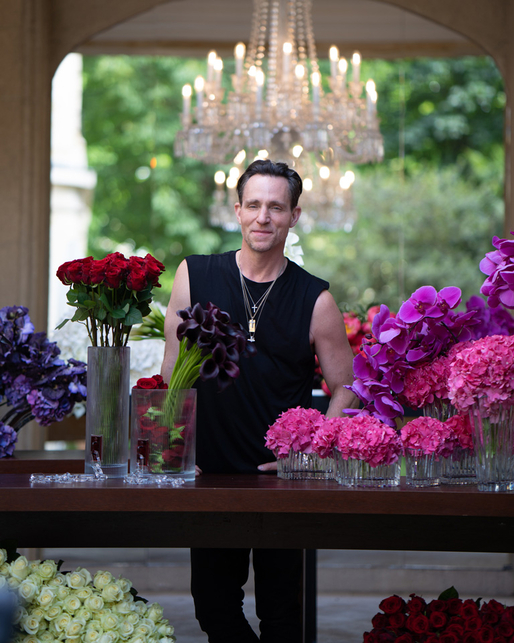 Jeff Leatham and floral arrangements in Baccarat vases