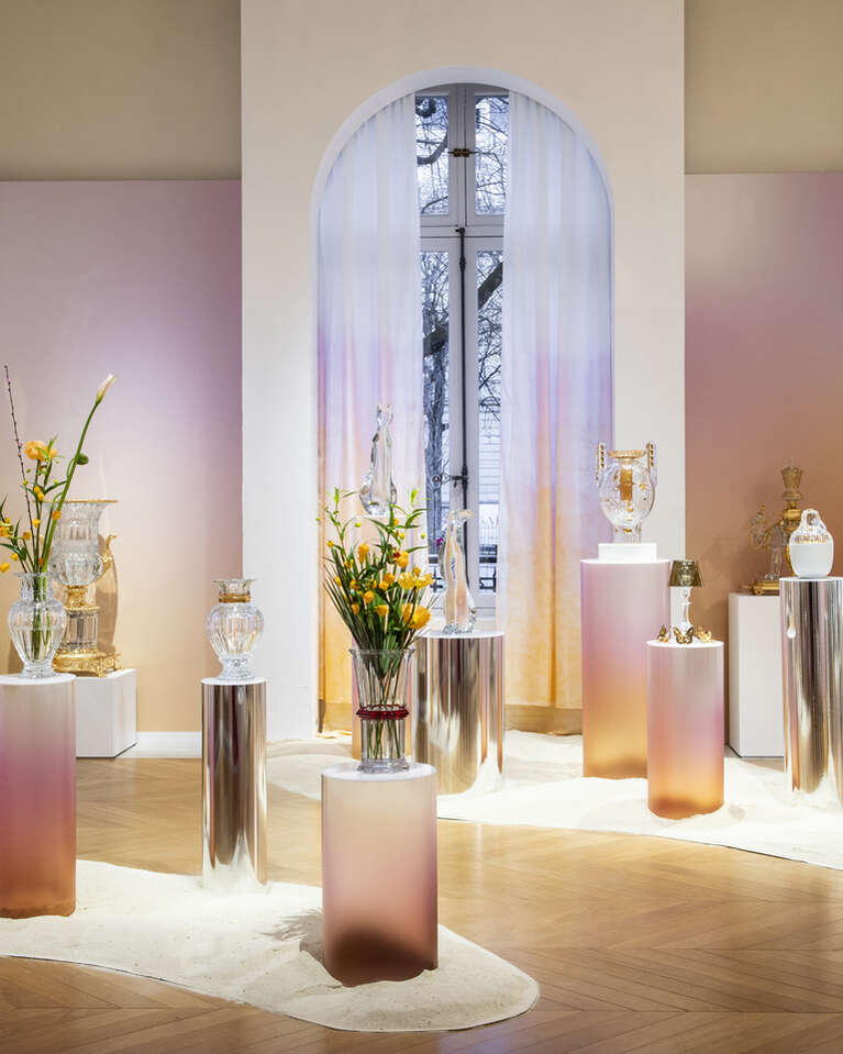 Vases, dog and cat sculptures, butterfly and candlestick in a Baccarat boutique